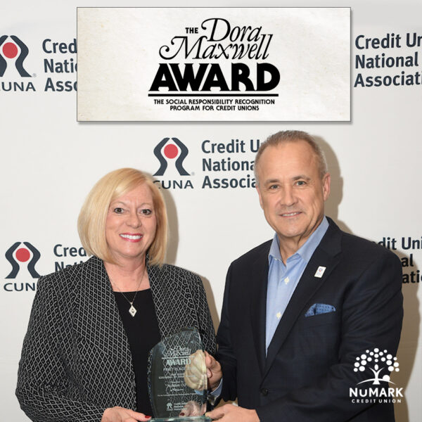Ann M Dubie PresidentCEO of NuMark Credit Union and Jim Nussle PresidentCEO of Credit Union National Association with 2020 Dora Maxwell Award