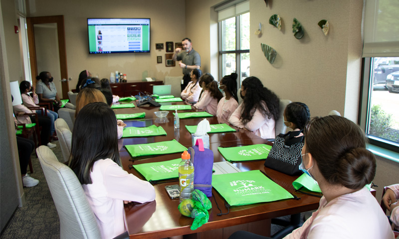 Mack Story NuMarks Training Manager presenting to the girls of Polished Pebbles