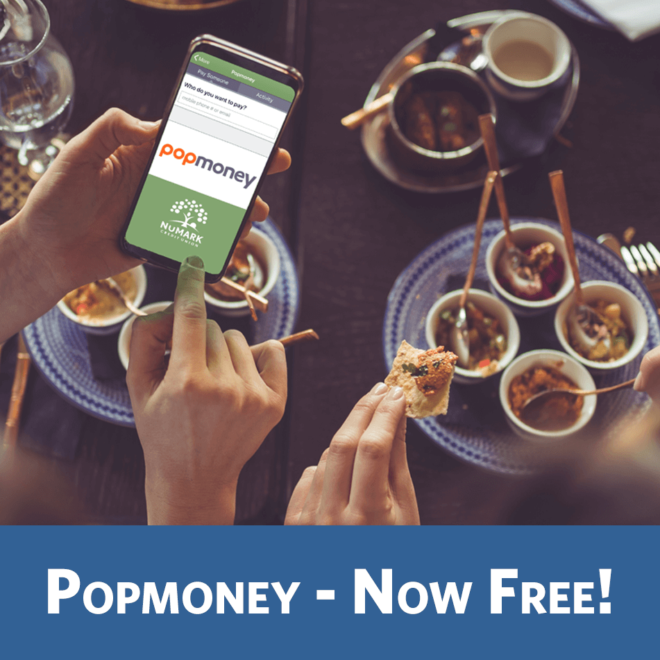 couple at restaurant and using mobile phone